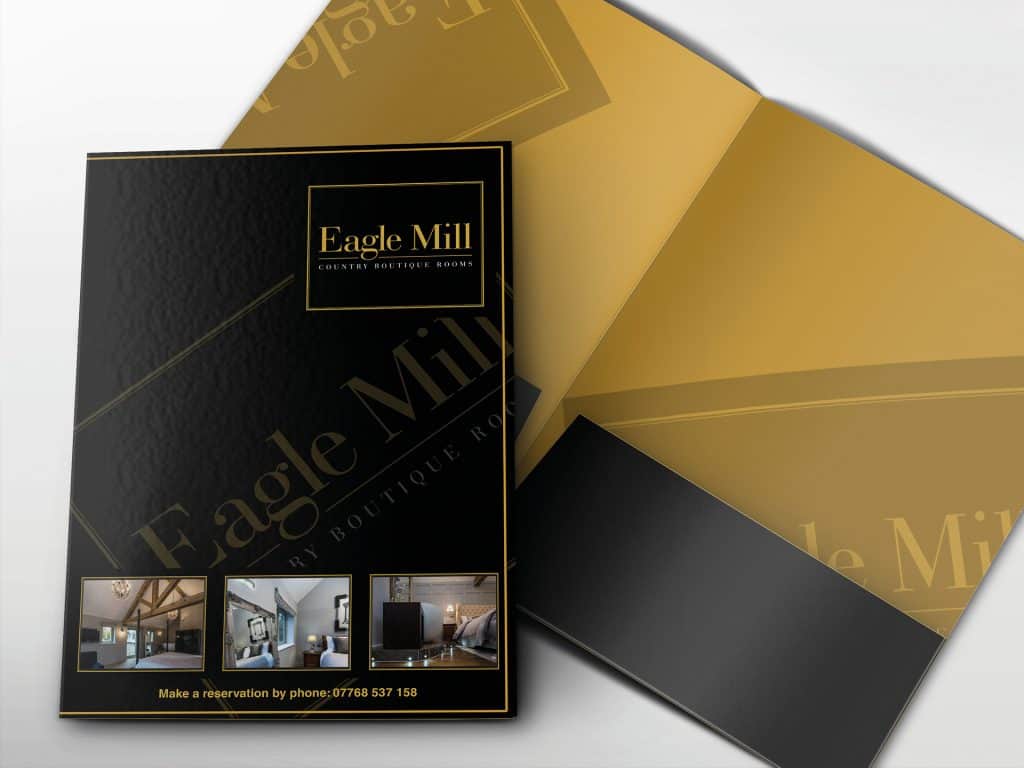 Black and gold Eagle Mill folder design with foil embossed logo