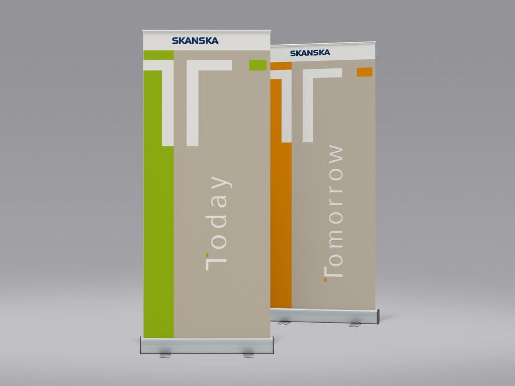Skanska roll-up banners with modern vertical layouts in green and orange.
